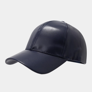 Detailed view of dark blue PU leather baseball cap featuring visible stitching and texture