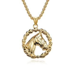 Vintage golden stainless steel horse head necklace pendant with wreath detail on white background