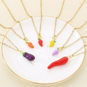 Colorful enamel vegetable necklaces with chili and eggplant pendants on gold chains