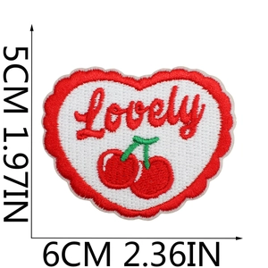 Detailed view of heart-shaped cherry embroidery patch with Lovely text and size markers