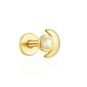 Detailed macro view of a golden crescent moon stud earring with opal stone inlay