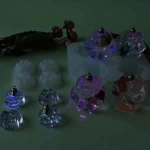 Detail of cat claw silicone molds with glowing LED resin finished art crafts