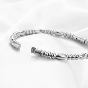 5mm silver bamboo style stainless steel bangle with high polish finish and buckle closure