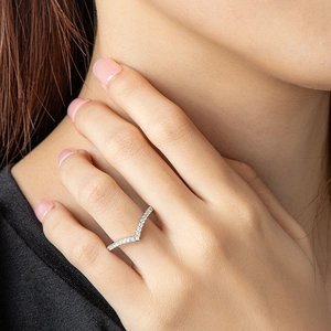 Elegant V-shaped S925 sterling silver ring with pavé-set moissanite diamonds on finger