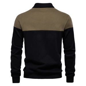 Detail of olive green and black color-block sweatshirt with ribbed cuffs and stand collar