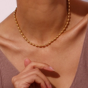 Minimalist 18K gold plated stainless steel necklace with oval bead chain on female model