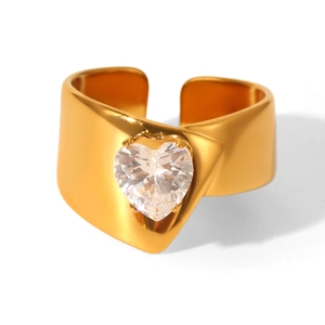 Detailed close-up of a wide gold-plated open ring featuring a large heart-shaped zircon
