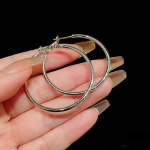 Minimalist silver-tone large round smooth hoop earrings for women, stylish design