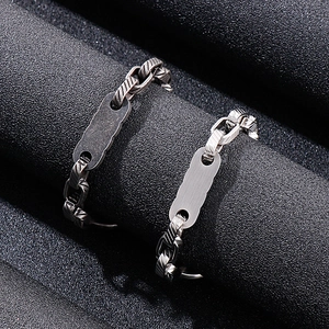 Retro stainless steel square link chain bracelet for men with polished ID tag detail