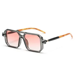 Fashionable double-bridge square sunglasses with pink gradient lenses and tortoiseshell arms