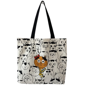 Detailed close-up of cute cat illustrations on white canvas tote bag with black handles