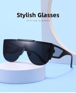 Detailed view of stylish oversized rimless sunglasses on a white stand for a modern look