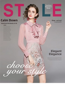 Close-up of pink long sleeve dress with floral embroidery and ruffled stand collar