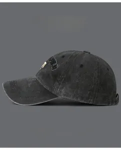 Side view of washed cotton baseball cap with vintage finish and metal adjustable buckle