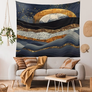 Detailed close-up of abstract mountain tapestry with golden moon in a modern living room
