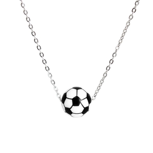 Macro detail of silver O-chain and classic black and white enamel football pendant necklace