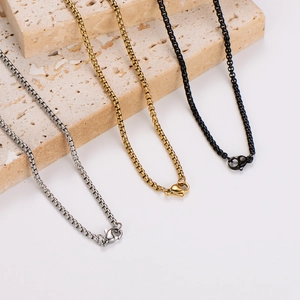Three-color stainless steel hollow cross necklaces in silver, gold, and black finishes
