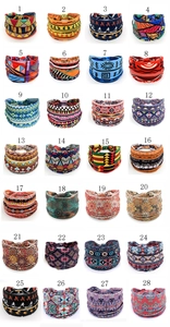 Collection of 28 elastic headbands featuring various African boho prints and tribal patterns