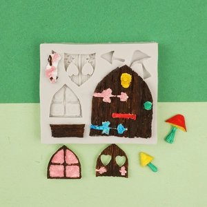 Fairy house silicone mold for fondant and resin featuring door, window, and mushroom shapes