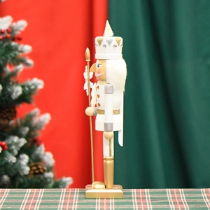 White and gold wooden nutcracker soldier ornament with glitter and crown for Christmas
