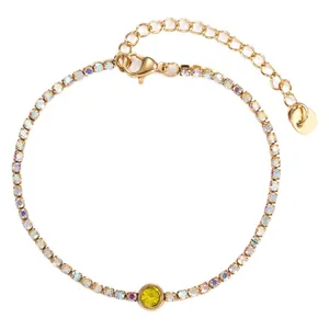 Bracelet en acier doré avec cristaux AB et une pierre ronde en zircone jaune