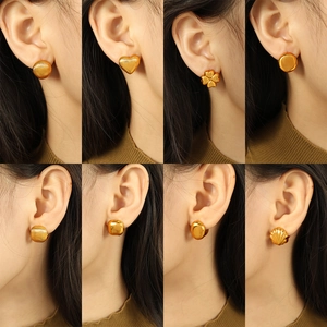 Collection de boucles d oreilles géométriques dorées formes cœur coquille et ronde