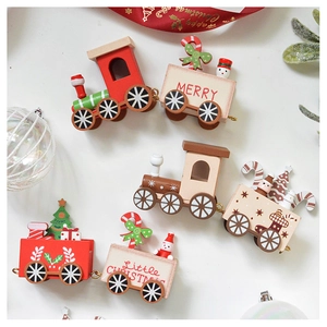 Close-up of wooden Christmas train decor with Merry letters and festive ornaments