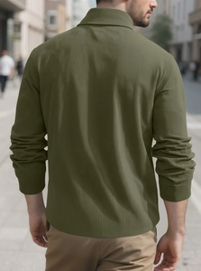 Detail of army green slim fit knit polo shirt showing vertical ribbed texture from the back
