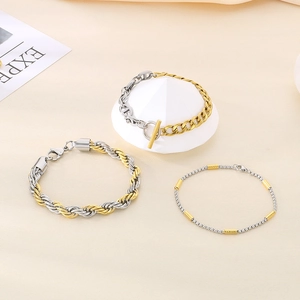 Two-tone silver and gold stainless steel bracelets with anchor chain and twisted design