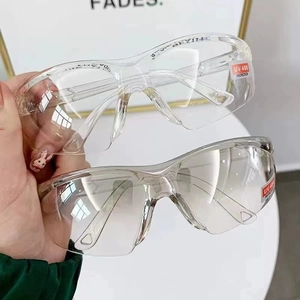 Detail view of anti-impact safety goggles with UV 400 protection and dual lens design