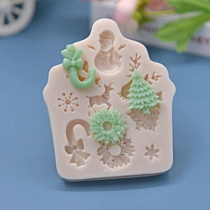 Christmas silicone mold featuring snowman, tree, and snowflake patterns for DIY baking cake