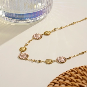 18K gold plated titanium steel daisy chain necklace with pink petals and crystal accents