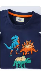 Detail of navy blue kids dinosaur T-shirt with orange neck tape and Dino Hunter print