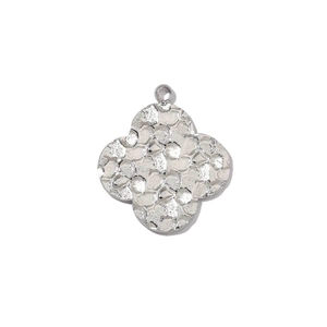 Macro shot of silver hammer-textured four-leaf clover pendant with polished finish