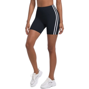 Detail view of high-waist black yoga shorts with breathable side double white stripes