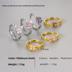 Detailed macro view of vine-shaped rings with colorful cubic zirconia flower petals