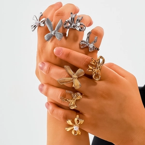 18K gold and silver bow-shaped stainless steel rings with pearl accents for women