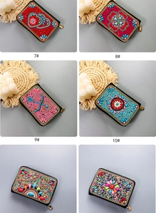 Detailed grid view of assorted bohemian handmade beaded coin purses with heart and floral motifs