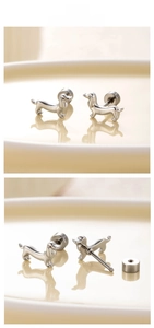 Detail of cute dachshund dog stud earrings with secure screw back closure design