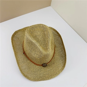 Close-up of breathable straw weave texture with vintage metal buckle on cowboy sun hat