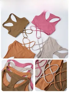 Detail showing cross-back thin straps and seamless texture of the yoga sports bra