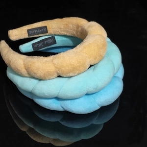 Braided velvet headbands in yellow and blue colors with high-top sponge padding