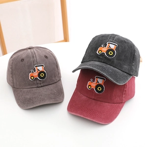 Three washed cotton kids baseball caps in grey black and red with tractor embroidery
