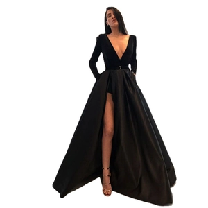 Elegant black velvet long sleeve evening gown with deep V-neck and high leg slit
