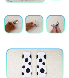 Detail of plush animal tail with metal clip and polka dot knitted wrist cuffs for kids