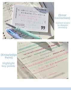 Close-up of pastel multicolor retractable gel pens with handwritten study notes on cards