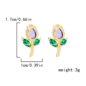 Detailed size view of tulip stud earrings with purple crystals and gold finish