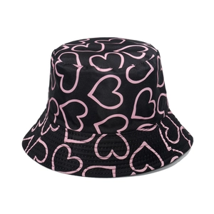 Black bucket hat with pink heart patterns and wide brim for sun protection