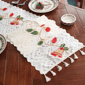 Lace Christmas table runner with bell embroidery and festive white tassel edges
