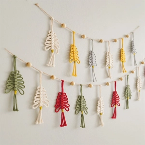 Handmade woven Christmas tree garland with colorful cotton ropes and wooden beads
